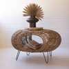 Kalalou If you're looking for a coffee table that's both stylish and functional, you'll love our Woven Oval Coffee Table With Open Storage. This beautiful table is made by skilled artisans in Haiti, and it's the perfect addition to any living space. (SKU# tb1) in another angle. This table is available in Coffee Table Mart now.